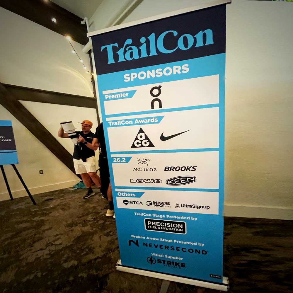 strike-rollup-banner-stand-display-custom-printed-convention-signage-trailcon-running-industry